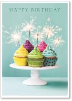 Cupcakes on plate with sparklers