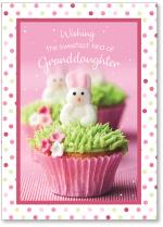Pink cupcake with bunny on top