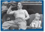 Vintage photo of dad and baby drinking