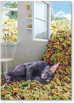 Chimp sleeping in bananas