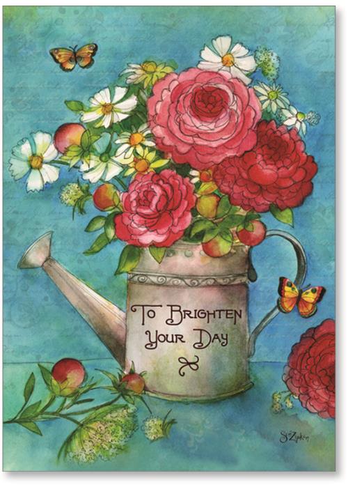 watering can with red  flowers