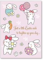 White bunnies with eggs and flowers