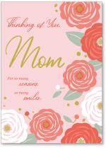 circular red and pink flowers with gold title Mom